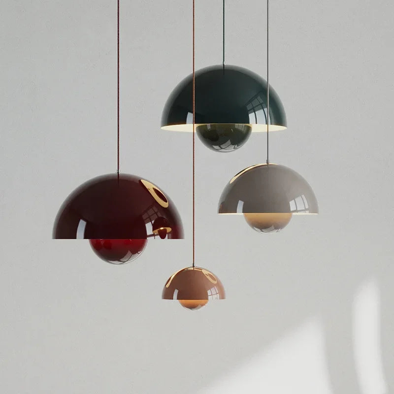 Fleur metal pendant light color range above a dining table