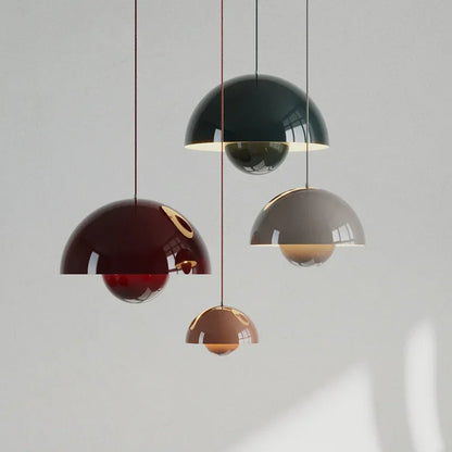 Fleur metal pendant light color range above a dining table