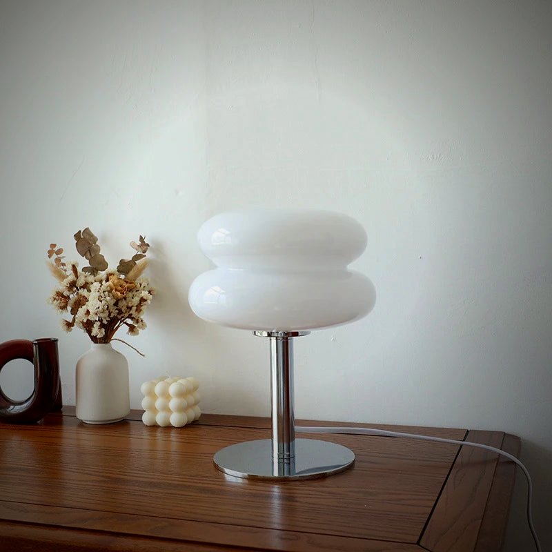 Ambra white glass macaron lamp on a console