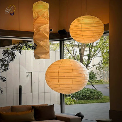 Two Kumo pendants over a lounge