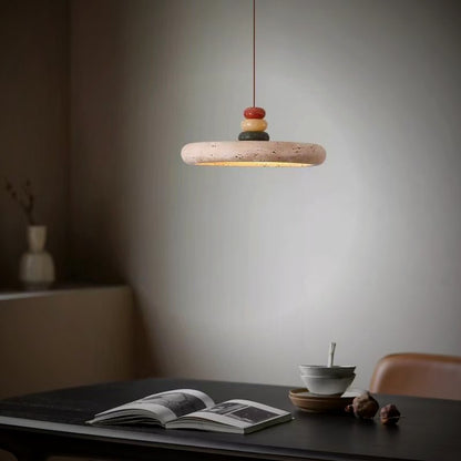 Mesa pendant lit over a dining table