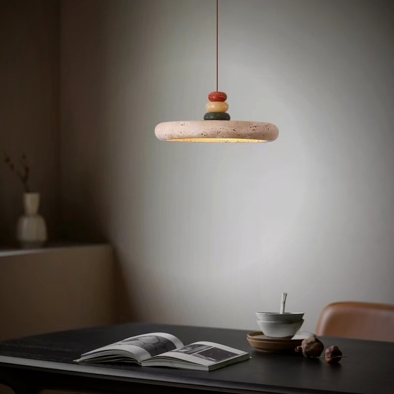 Mesa pendant lit over a dining table