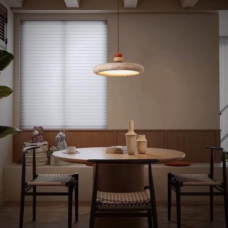 Mesa pendant over a round breakfast table