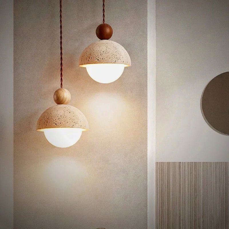 Orsa travertine dome pendant with an opal glass globe