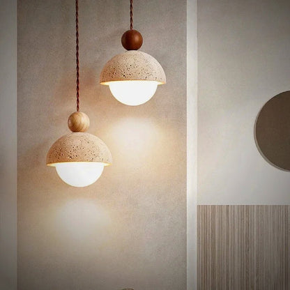 Orsa travertine dome pendant with an opal glass globe