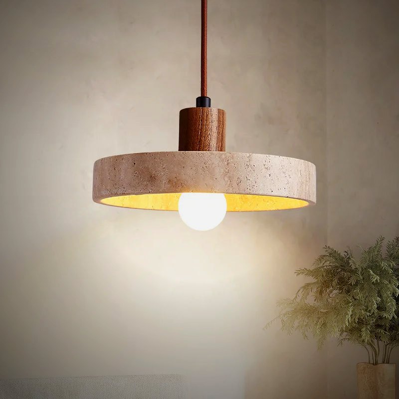 Tora travertine disc pendant on a walnut socket