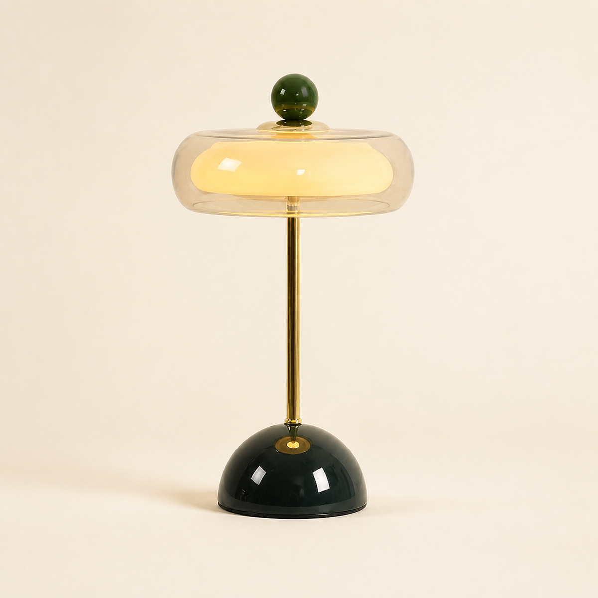 Dark green Oria rechargeable glass table lamp with a clear dome shade