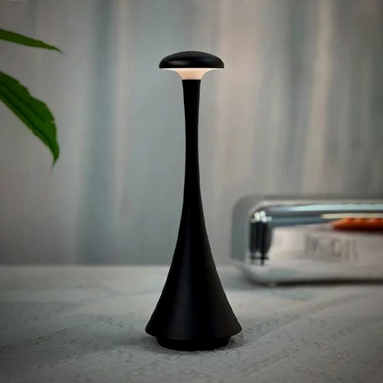 Pip lamp in black on a kitchen counter