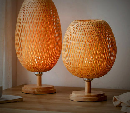 Willow bamboo lamp pair, light pattern thrown across the wall