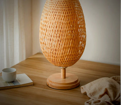 Willow bamboo table lamp unlit, sculptural weave by day